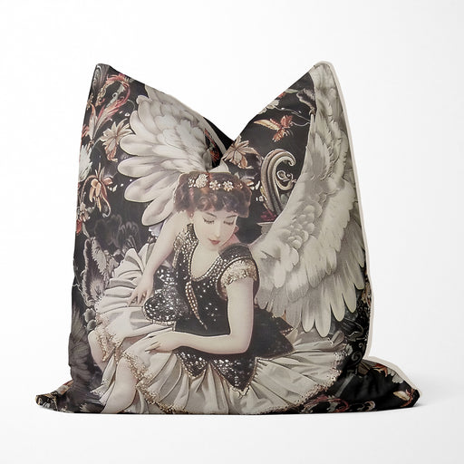 Celestial cushion pillow cover of a sophisticated angel in a pretty dress covered in sequins with huge white feathered wings surrounded by delicate flowers on a black background