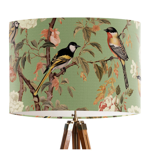 Pink and peach flowers and country garden birds on branches on a soft pale green backdrop on a classic sized 30x21cm handcrafted fabric lampshade by artist Kelly Stevens-McLaughlan