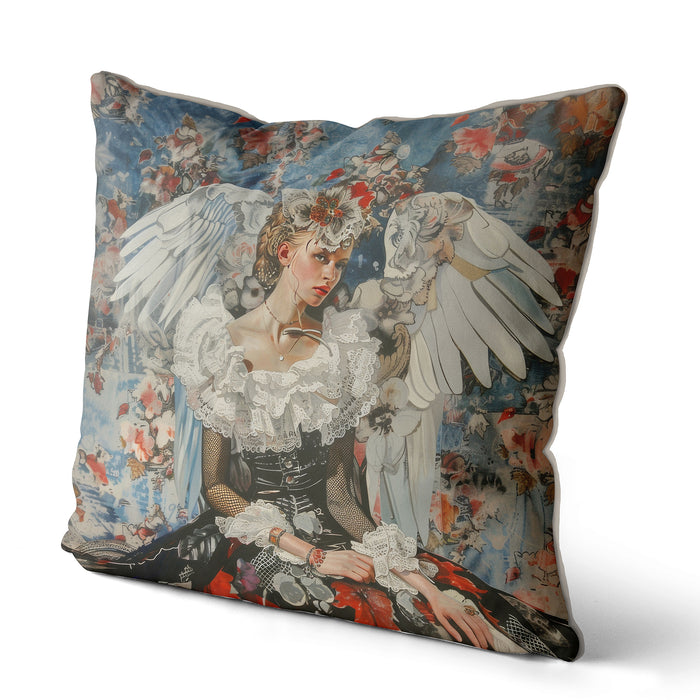 Modern cushion pillow cover of a angel in a sexy black dress with fishnet sleeves and giant white feathered wings on a blue and pink floral background. Finished with chic silver bias piping 