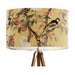 Pink and peach flowers and country garden birds on branches on a soft warm yellow background on a large sized 40x25cm handcrafted fabric lampshade by artist Kelly Stevens-McLaughlan