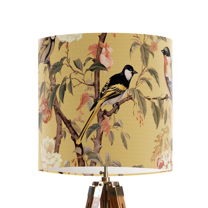 Pink and peach flowers and country garden birds on branches on a soft warm yellow background on a small sized 20x18cm handcrafted fabric lampshade by artist Kelly Stevens-McLaughlan